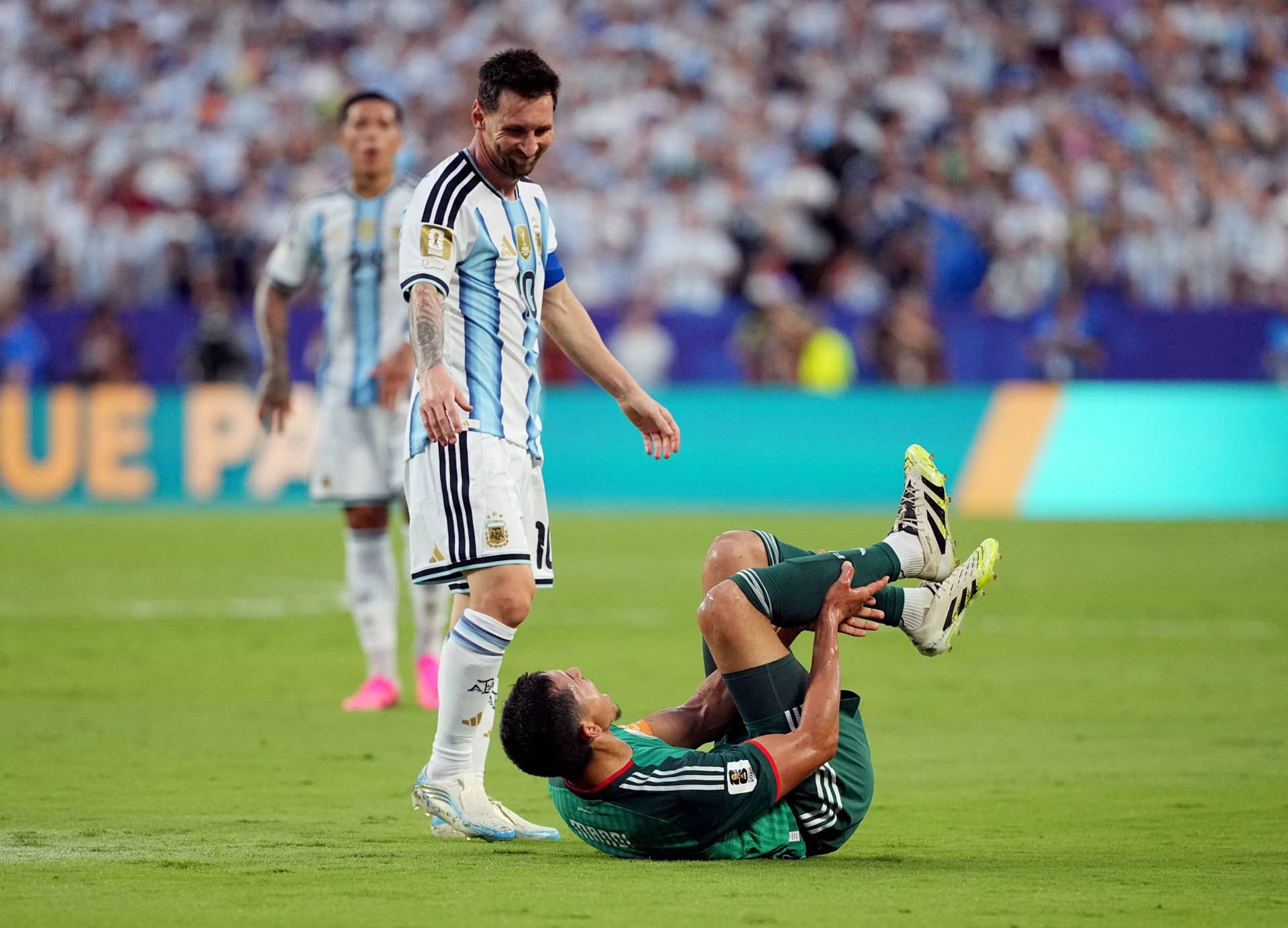 ESPN Analyst Says Lionel Messi Deserved Red Card for 'Clumsy' Challenge on  Algeria's Aissa Mandi - Athlon