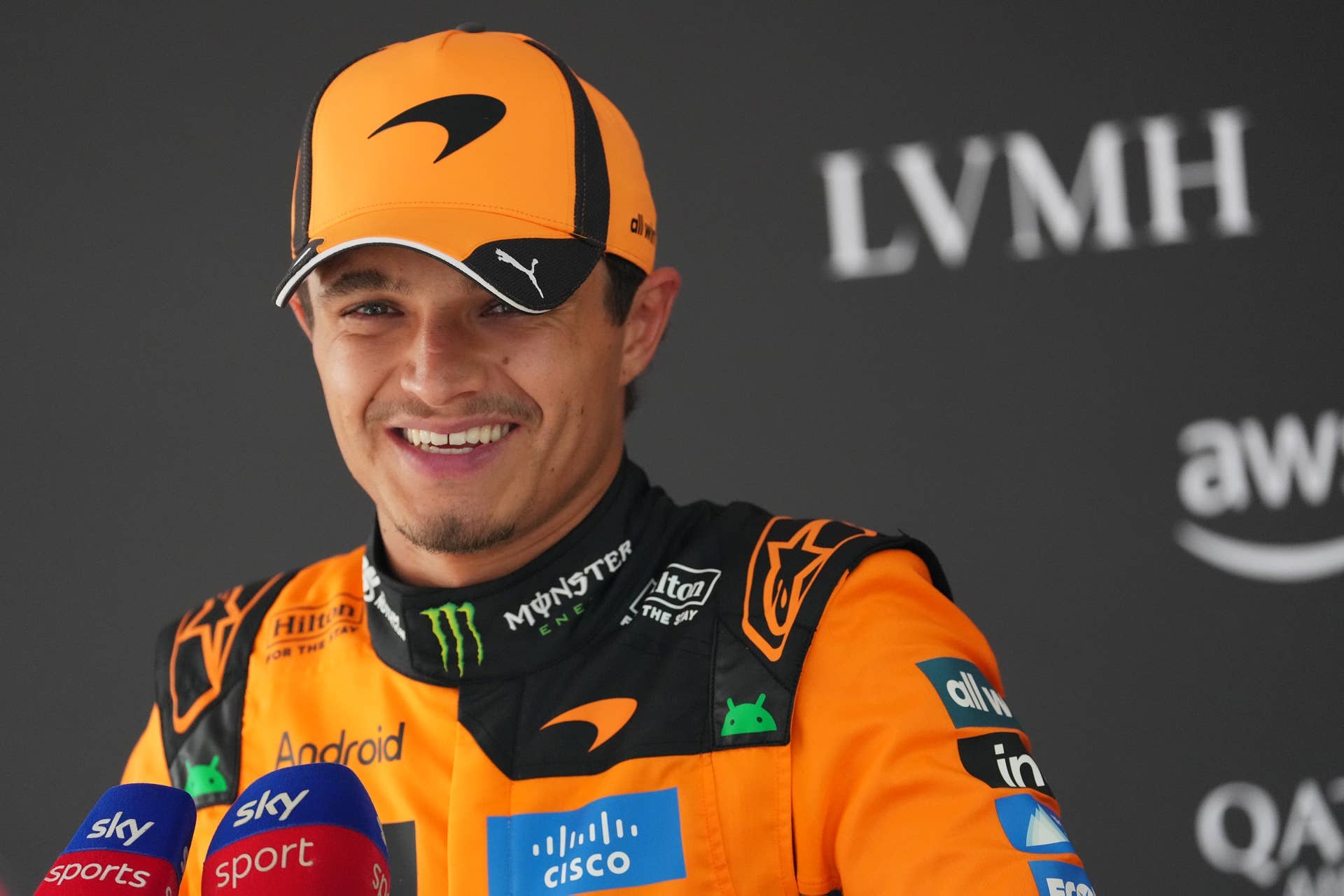 Third placed qualifier Lando Norris of Great Britain and McLaren is interviewed during qualifying ahead of the F1 Grand Prix of Belgium at Circuit de Spa-Francorchamps.