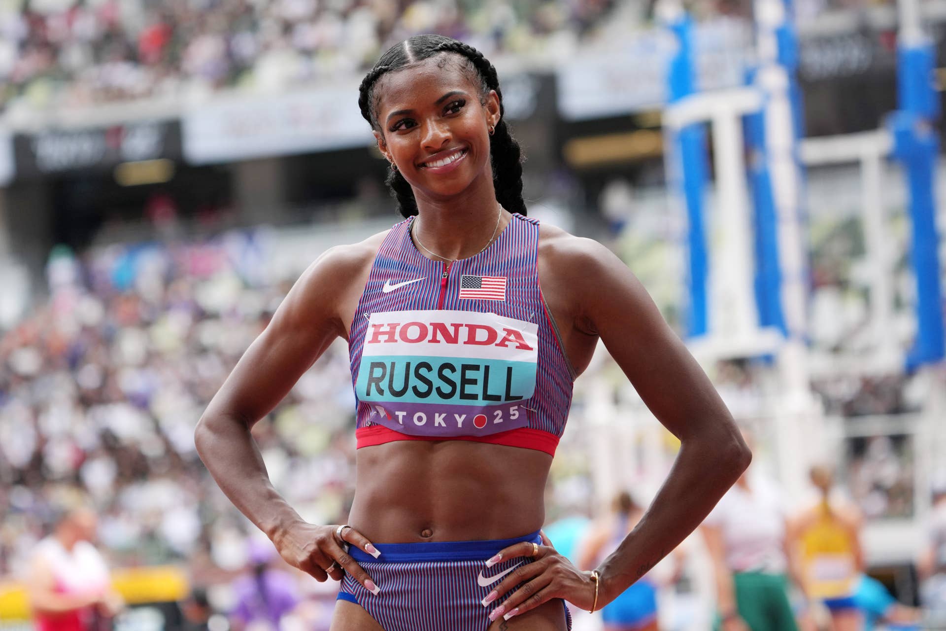us-olympic-gold-medalist-masai-russell-breaks-world-record-in-hurdles