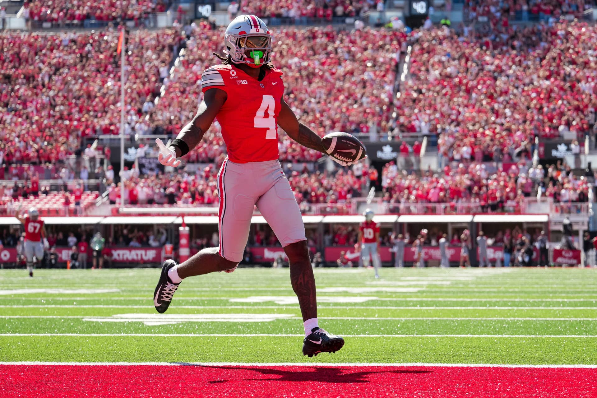 Jeremiah Smith gets 12 catches for 217 yards and 4 TDs against Illinois ...