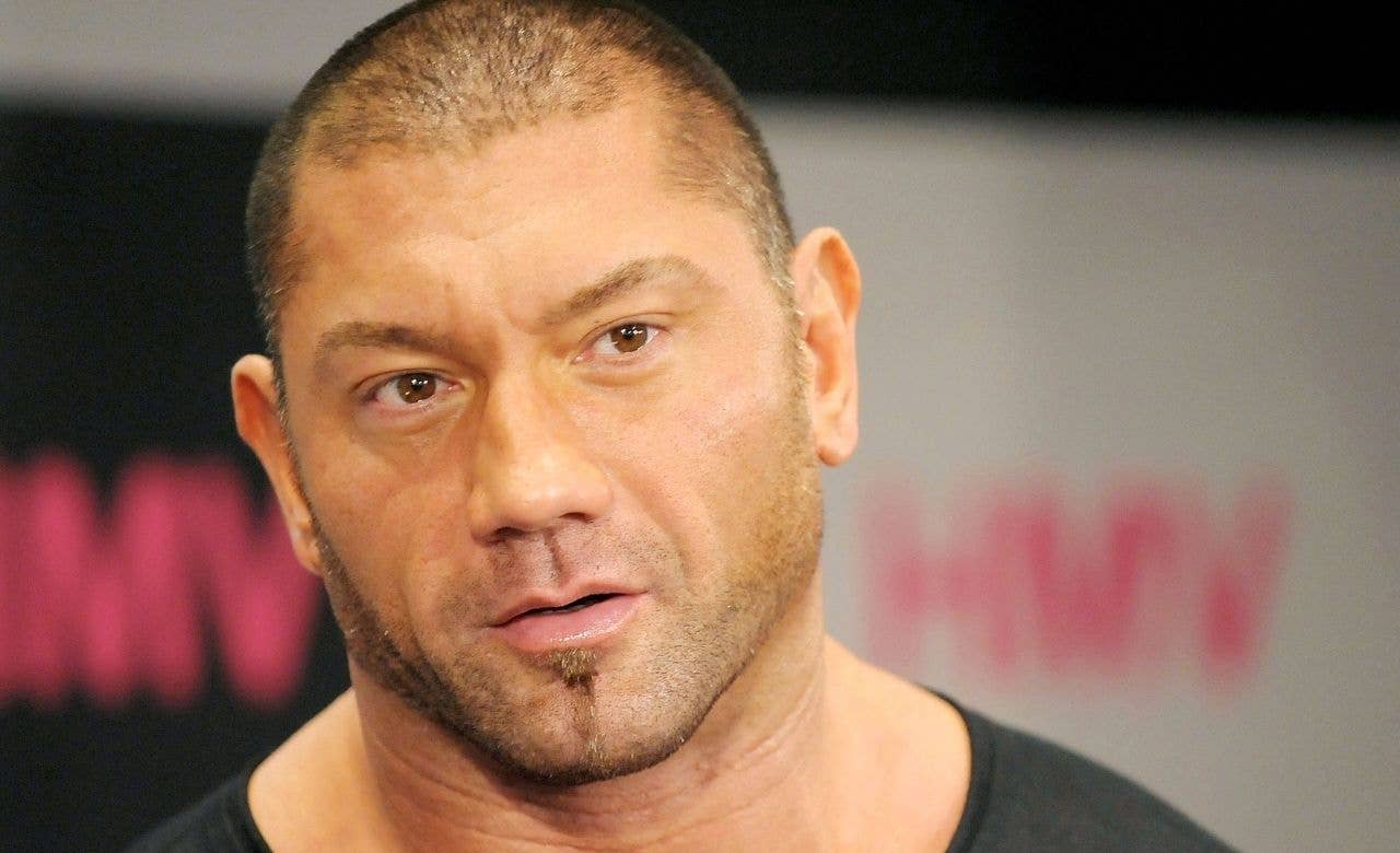 Dave Bautista Pens Emotional Tribute to WWE's 'Sign Guy' Rick Achberger ...