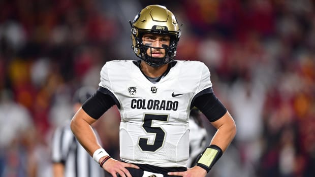 Los Angeles, California, USA; Colorado Buffaloes quarterback J.T. Shrout (5) reacts after being called for intentional grounding during the first half at the Los Angeles Memorial Coliseum.