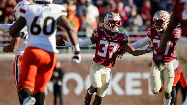 Florida State Seminoles defensive back Omarion Cooper (37 celebrates an interception. The Florida State Seminoles lead the Miami Hurricanes 20-7 at the half Saturday, Nov. 13, 2021. Fsu V Miami263