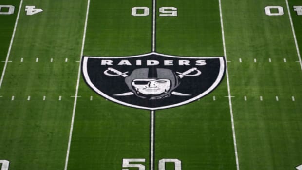 The Raiders' logo at midfield.