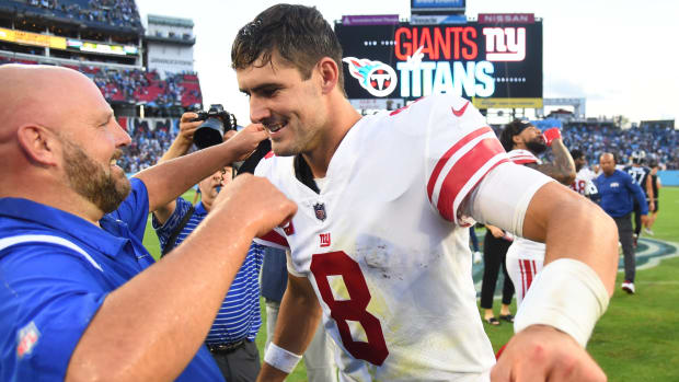 Sep 11, 2022; Nashville, Tennessee, USA; New York Giants head coach Brian Daboll celebrates with quarterback Daniel Jones (8) after a win against the Tennessee Titans at Nissan Stadium.