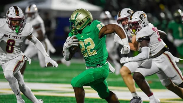Alabama commit Justice Haynes rushed for 216 yards to help Buford secure a 39-27 win over Mill Creek on October 14, 2022.