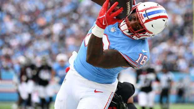 Tennessee Titans wide receiver Treylon Burks (16) catches a pass along the sideline but is unable to get his feet down during the first half against the Atlanta Falcons at Nissan Stadium.