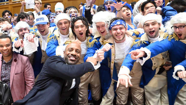  ESPN basketball commentator Jay Williams (front) greets Duke students prior to a game between the North Carolina Tar Heels and the Duke Blue Devils at Cameron Indoor Stadium.