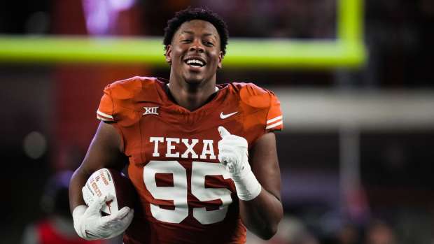 Texas defensive lineman Alfred Collins (95) runs down the field during the Senior Night celebration ahead the Longhorns' game against the Texas Tech Red Raiders, Friday, Nov. 24, 2023 at Darrell K Royal-Texas Memorial Stadium in Austin.  