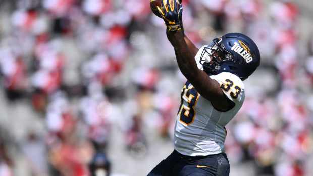 Sep 24, 2022; San Diego, California, USA; Toledo Rockets running back Peny Boone (33) makes a catch against the San Diego State Aztecs during the first half at Snapdragon Stadium