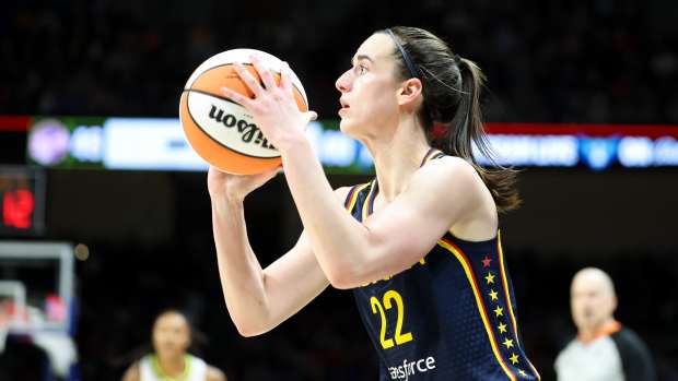 May 3, 2024; Dallas, Texas, USA; Indiana Fever guard Caitlin Clark (22) shoots during the second quarter against the Dallas Wings at College Park Center.