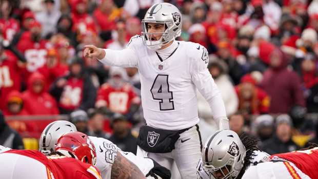 Dec 25, 2023; Kansas City, Missouri, USA; Las Vegas Raiders quarterback Aidan O'Connell (4) gestures at the line of scrimmage against the Kansas City Chiefs during the second half at GEHA Field at Arrowhead Stadium. Mandatory Credit: Denny Medley-USA TODAY Sports