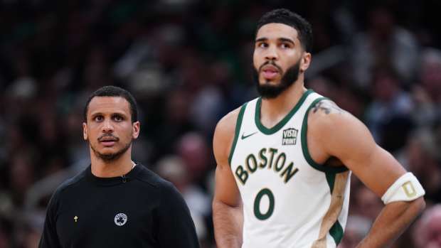 Jan 19, 2024; Boston, Massachusetts, USA; Boston Celtics head coach Joe Mazzulla with forward Jayson Tatum (0) look on from the sideline as they take on the Denver Nuggets at TD Garden.