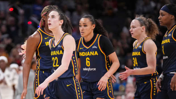 Indiana Fever guard Caitlin Clark (22) walks off the court during a time-out Thursday, May 9, 2024, during the preseason game against the Atlanta Dream at Gainbridge Fieldhouse in Indianapolis.