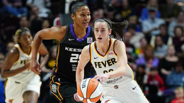 May 14, 2024; Uncasville, Connecticut, USA; Indiana Fever guard Caitlin Clark (22) returns the ball against the Connecticut Sun in the second quarter at Mohegan Sun Arena.