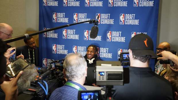 May 14, 2024; Chicago, IL, USA; Bronny James talks to the media during the 2024 NBA Draft Combine at Wintrust Arena.