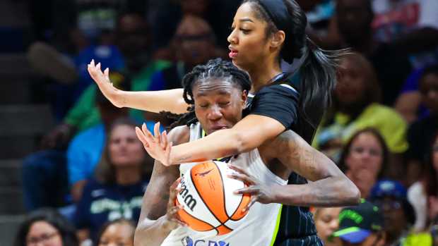 Dallas Wings forward Natasha Howard (6) looks to score as Chicago Sky forward Angel Reese (5) defends during the second half at College Park Center.