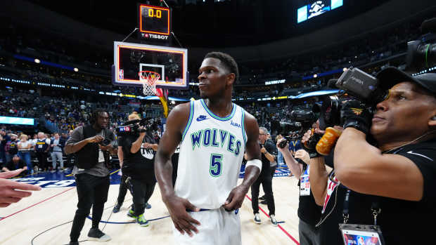 May 19, 2024; Denver, Colorado, USA; Minnesota Timberwolves guard Anthony Edwards (5) looks back following game seven against the Denver Nuggets of the second round for the 2024 NBA playoffs at Ball Arena.