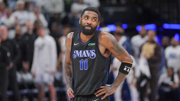 May 24, 2024; Minneapolis, Minnesota, USA; Dallas Mavericks guard Kyrie Irving (11) reacts in the fourth quarter against the Minnesota Timberwolves in game two of the western conference finals for the 2024 NBA playoffs at Target Center. Mandatory Credit: Brad Rempel-USA TODAY Sports  