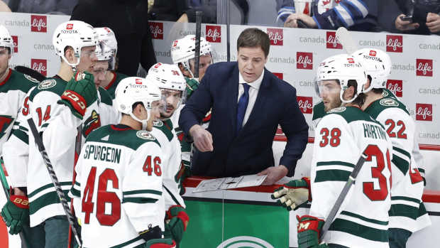 Feb 8, 2022; Winnipeg, Manitoba, CAN; Minnesota Wild Assistant Coach Darby Hendrickson plans out a play in the third period against the Winnipeg Jets at Canada Life Centre.