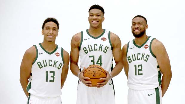 Sep 25, 2017; Milwaukee, WI, USA; Milwaukee Bucks guard Malcolm Brogdon (13) Milwaukee Bucks forward Giannis Antetokounmpo (34) and Milwaukee Bucks forward Jabari Parker (12) during media day at Froedtert & the Medical College of Wisconsin Sports Science Center.