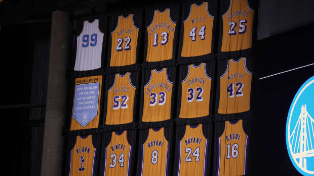 May 8, 2023; Los Angeles, California, USA; The Los Angeles Lakers retired jereys of Kareem Abdul-Jabbar (33), Elgin Baylor (22), Kobe Bryant (8 and 24), Pau Gasol (16), Gail Goodrich (25), Magic Johnson (32), Shaquille O'Neal (34), jerry West (44), Jamaal Wilkes (52), James Worthy (42), George Mikan (99) and Chick Hearn during game four of the 2023 NBA playoffs at Crypto.com Arena.