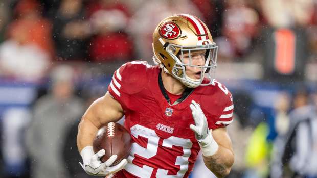 San Francisco 49ers running back Christian McCaffrey (23) runs the ball against the Green Bay Packers