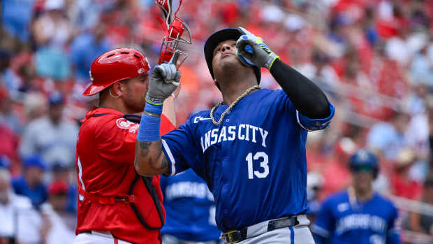 Jul 10, 2024; St. Louis, Missouri, USA; Kansas City Royals catcher Salvador Perez (13) reacts after hitting a solo home run against the St. Louis Cardinals during the sixth inning at Busch Stadium.