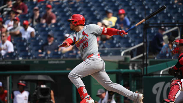 Jul 7, 2024; Washington, District of Columbia, USA; St. Louis Cardinals third baseman Nolan Arenado (28) hits a single against the Washington Nationals during the seventh inning at Nationals Park.