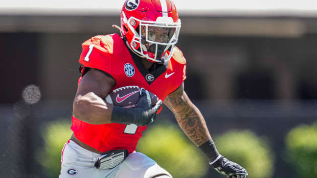 Apr 13, 2024; Athens, GA, USA; Georgia Bulldogs running back Trevor Etienne (1) runs with the ball during the G-Day Game at Sanford Stadium.