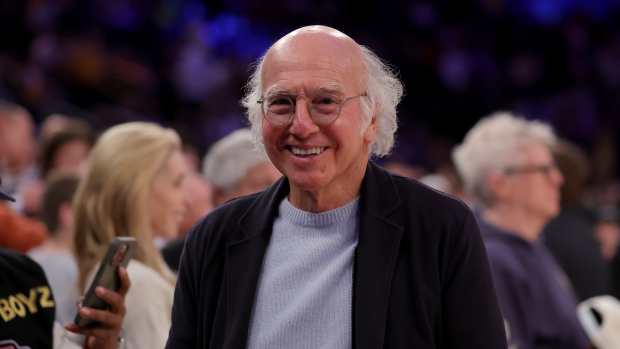Feb 3, 2024; New York, New York, USA; American comedian and producer Larry David walks to his court side seat before a game between the New York Knicks and the Los Angeles Lakers at Madison Square Garden.