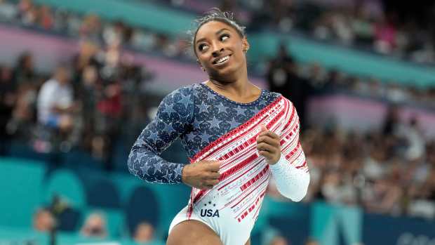 Simone Biles Sends Strong Message To USA Gymnastics After Making Olympics  History - Athlon Sports