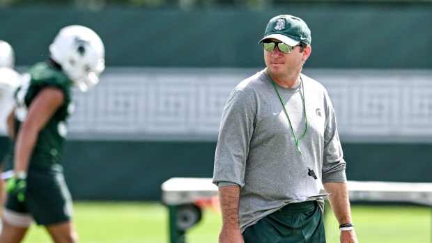 Michigan State's head coach Jonathan Smith watches over the action during the first day of football camp on Tuesday, July 30, 2024, in East Lansing - Nick King/Lansing State Journal / USA TODAY NETWORK