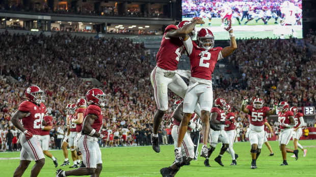 Alabama Crimson Tide quarterback Jalen Milroe (4) and wide receiver Ryan Williams (2) celebrate.