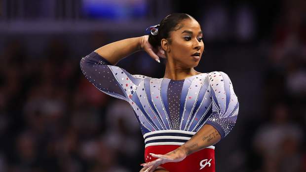 Jun 28, 2024; Minneapolis, Minnesota, USA; Jordan Chiles competes on the beam during the U.S. Olympic Team Gymnastics Trials at Target Center.