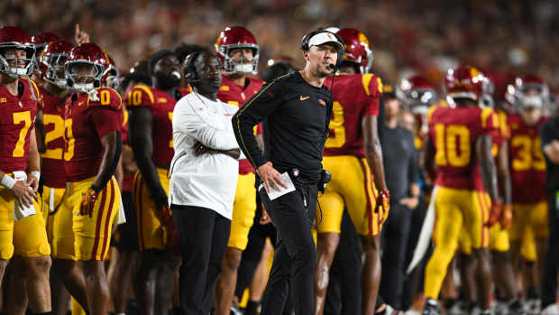 Los Angeles, California, USA; USC Trojans head coach Lincoln Riley reacts against the Utah State Aggies during the first quarter at United Airlines Field at Los Angeles Memorial Coliseum - Jonathan Hui-Imagn Images