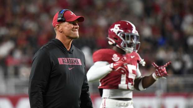 Alabama Crimson Tide head coach Kalen DeBoer watches as the Tide loses a fumble near the South Florida Bulls goal line.