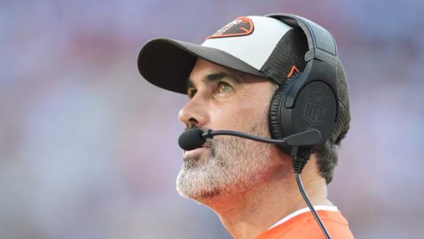 Cleveland Browns head coach Kevin Stefanski looks at the scoreboard during the second half against the Dallas Cowboys at Huntington Bank Field.