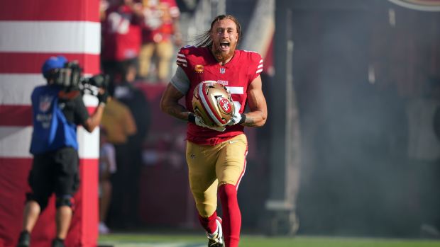 Santa Clara, California, USA; San Francisco 49ers tight end George Kittle (85) is introduced to the crowd before the game against the New York Jets at Levi's Stadium - Darren Yamashita-Imagn Images