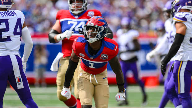 New York Giants wide receiver Malik Nabers (1) reacts after making a catch against the Minnesota Vikings during the second half at MetLife Stadium. 