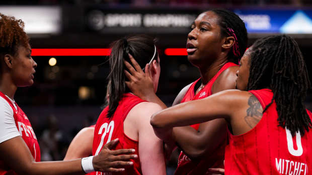 Indiana Fever forward Aliyah Boston hugs guard Caitlin Clark.