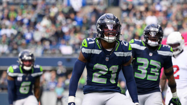 Seattle Seahawks cornerback Devon Witherspoon (21) celebrates after the defense made a play against the Arizona Cardinals during the second half at Lumen Field. 