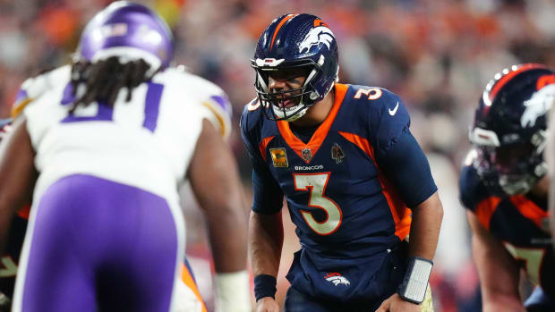 Nov 19, 2023; Denver, Colorado, USA; Denver Broncos quarterback Russell Wilson (3) reacts against the Minnesota Vikings in the fourth quarter at Empower Field at Mile High. Mandatory Credit: Ron Chenoy-USA TODAY Sports