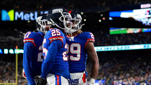 Dec 11, 2023; East Rutherford, New Jersey, USA; New York Giants cornerback Deonte Banks (25) celebrates after a play during the fourth quarter against the Green Bay Packers at MetLife Stadium.