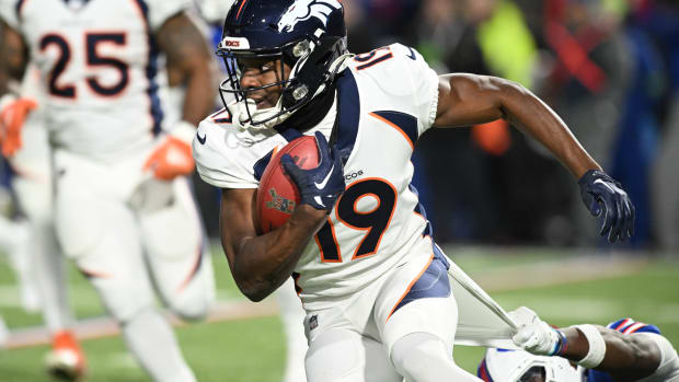 Denver Broncos wide receiver Marvin Mims Jr. (19) returns a kickoff against the Buffalo Bills in the third quarter at Highmark Stadium.