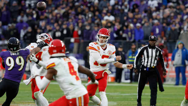 Jan 28, 2024; Baltimore, Maryland, USA; Kansas City Chiefs quarterback Patrick Mahomes (15) throws the ball to Chiefs wide receiver Rashee Rice (4) against the Baltimore Ravens during the second half in the AFC Championship football game at M&T Bank Stadium. Mandatory Credit: Geoff Burke-USA TODAY Sports  