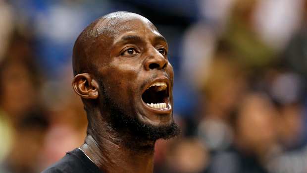Minnesota Timberwolves forward Kevin Garnett (21) reacts to a shot in warmups before the game with the Milwaukee Bucks at Target Center in 2016.