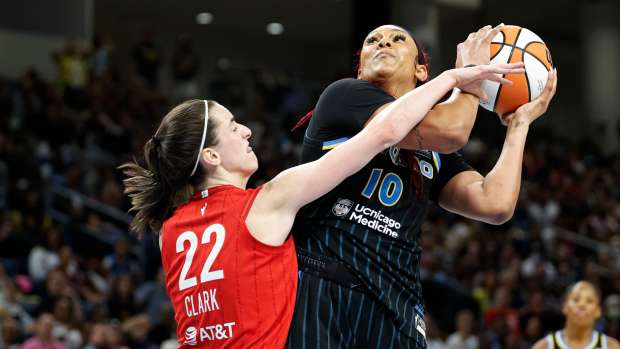 Indiana Fever guard Caitlin Clark and Chicago Sky center Kamilla Cardoso