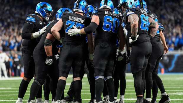 Detroit Lions in a huddle
