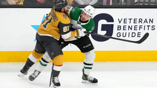 Vegas Golden Knights right wing Jonathan Marchessault (81) checks Dallas Stars left wing Jason Robertson (21) during the third period of game four of the first round of the 2024 Stanley Cup Playoffs a... 